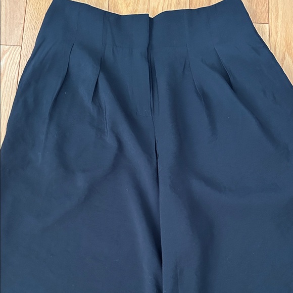 By Anthropologie High-Rise Pleated Wide-Leg Trousers in Black - Picture 9 of 16